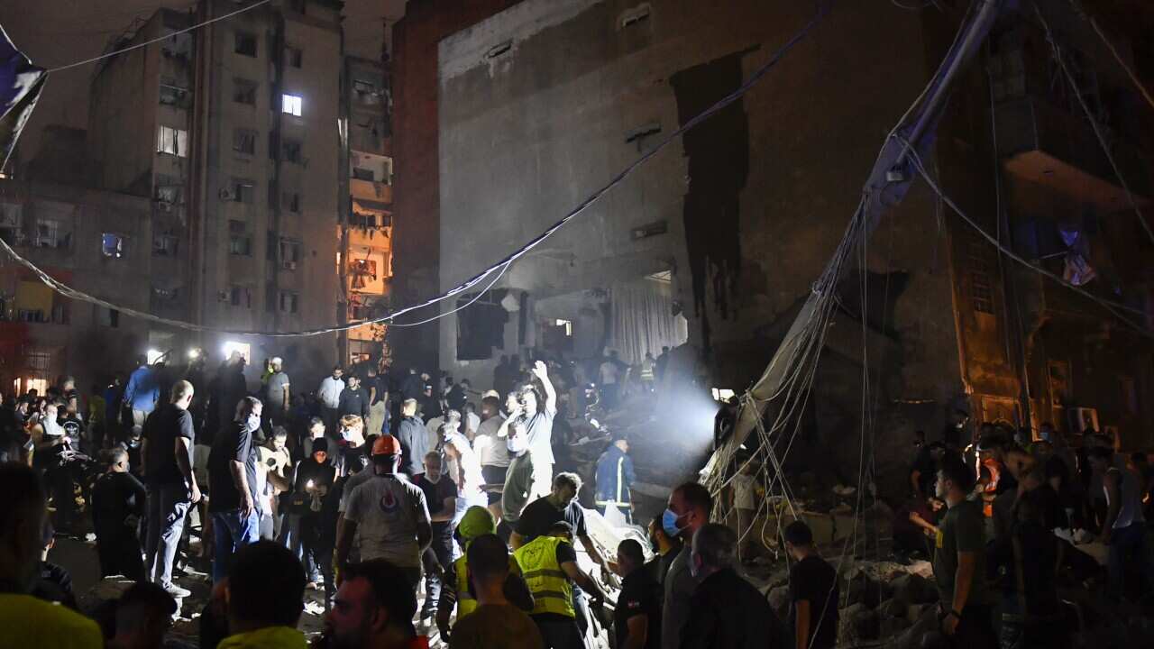 Israeli attacks on central Beirut kill at least 22; UN peacekeepers injured in tank attack